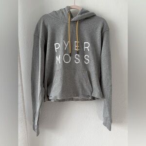 Pyer Moss Ebroidered Logo Crop Kangaroo Pocket Hoodie
100% Cotton Size Small
